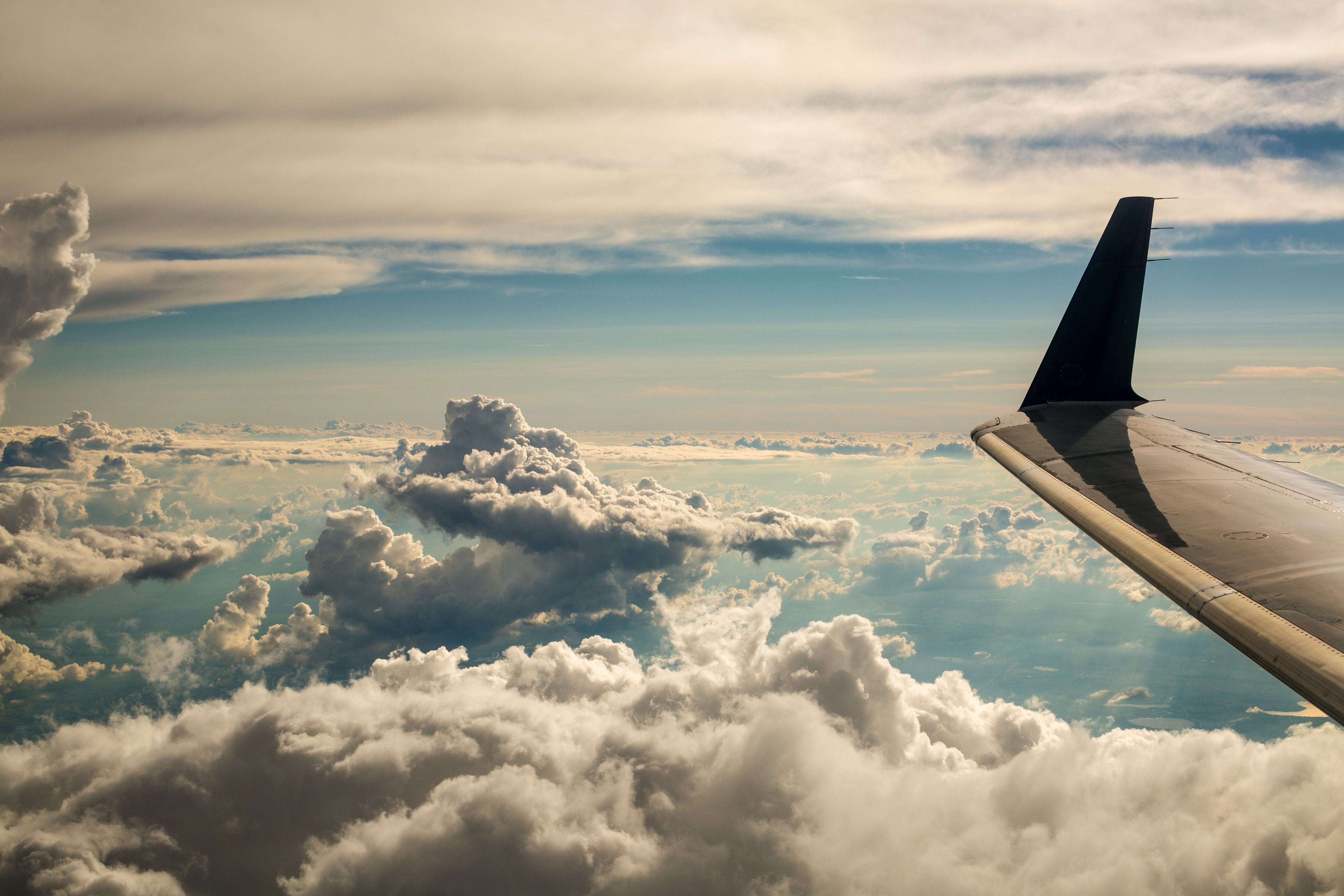 Travel Sustainably, Airplane Clouds